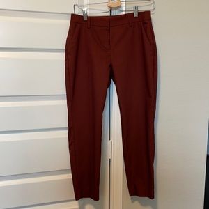 Burgundy/burnt orange/red dress pants from Express